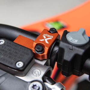 Bridă X-Grip protecție pompă ambreiaj Brembo pt. KTM/ Husqvarna/ Sherco portocaliu