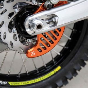 Protecție disc fr&acirc;nă spate X-Grip KTM/Husqv./Gasgas 24->portocaliu